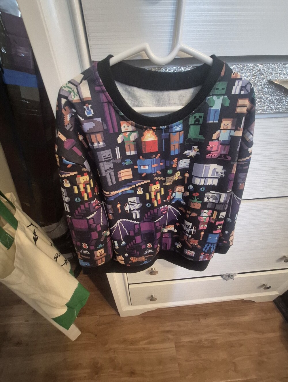 Pixel Character Graphic Sweatshirt in Black with Multicolor Print